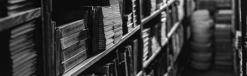Shelves full of dusty old books